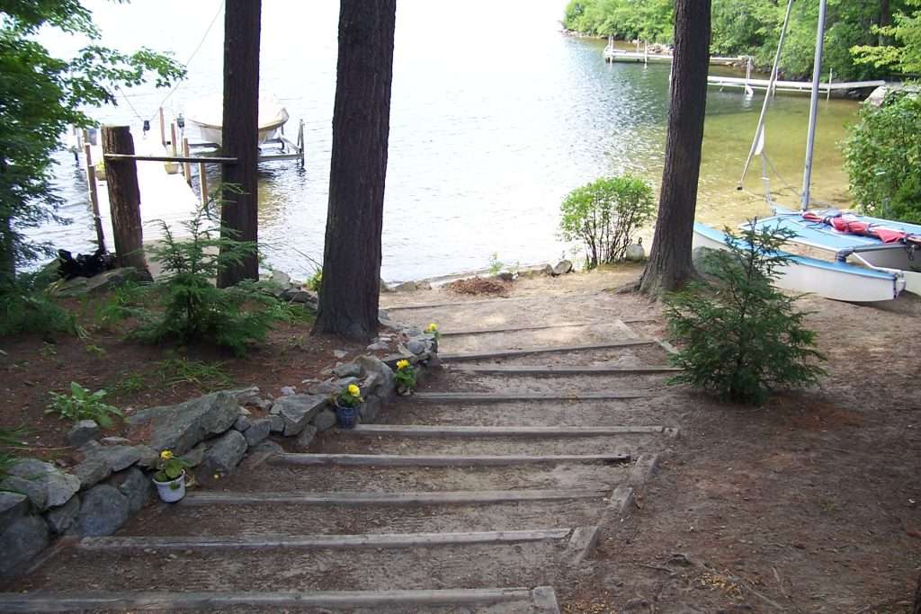 Before photo of Lakeside permeable paver patio with granite steps
