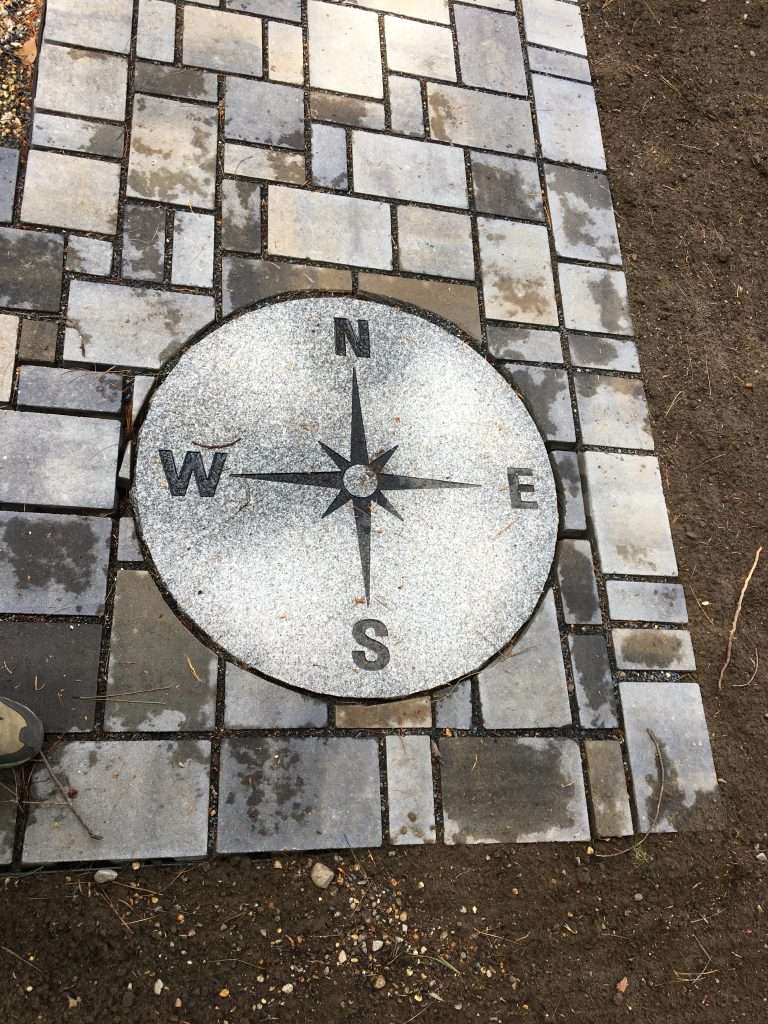 Granite compass set into paver area_1_1