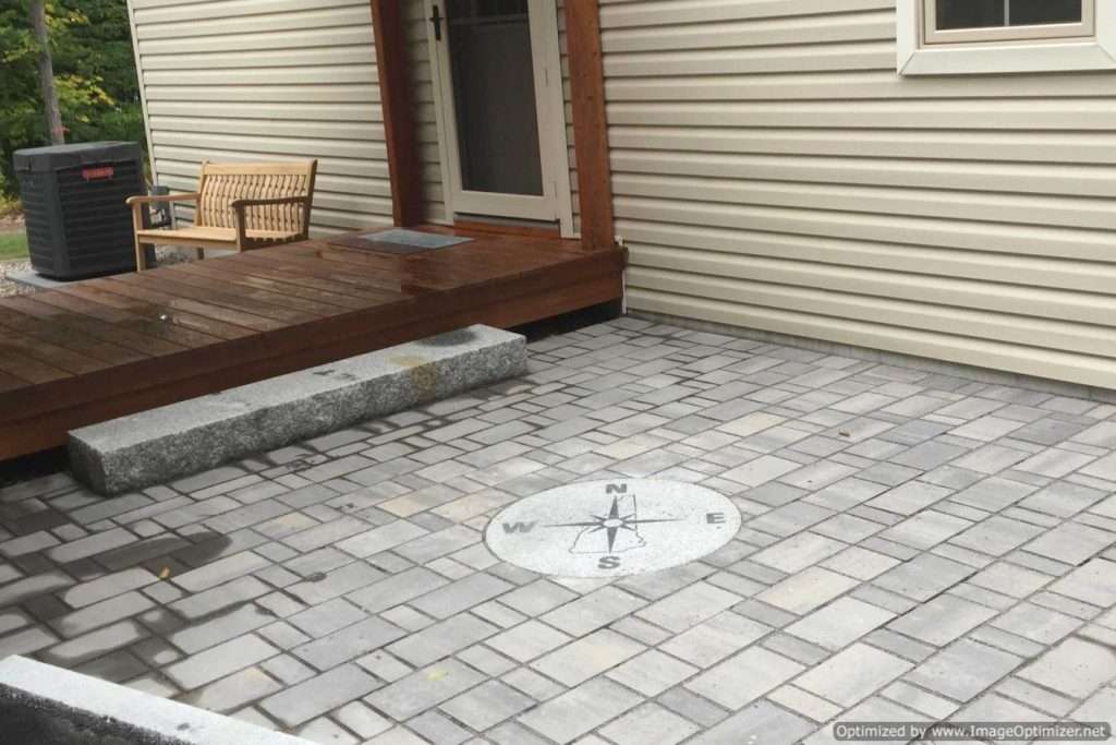 patio with compass stone